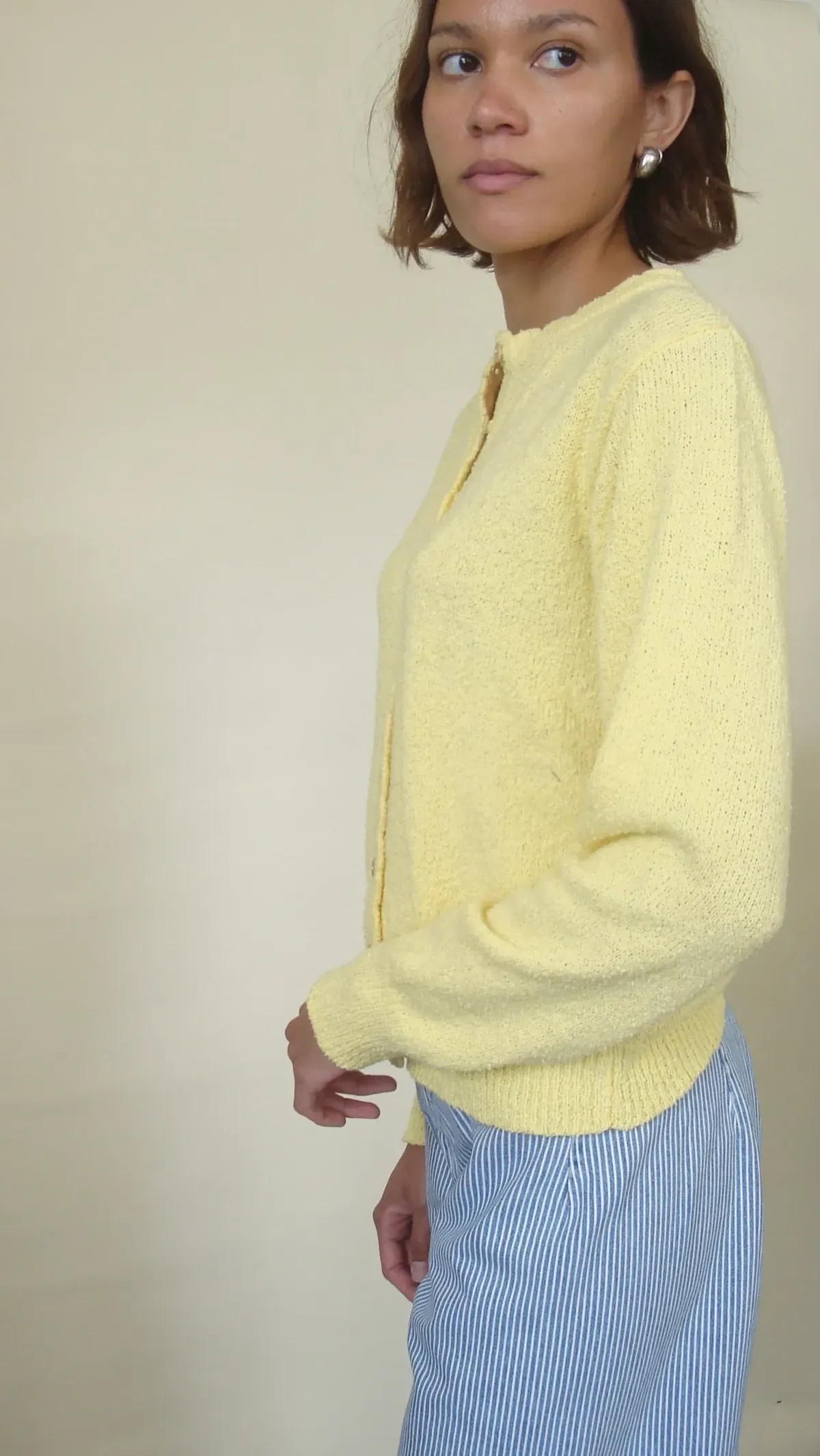Hand-knit yellow boucle cardigan
